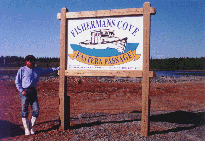 Mike next to the Fishermans Cove Sign